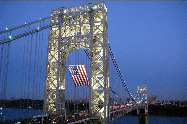 Photograph of the bridge and flag in 2007 by wallyg on Flickr